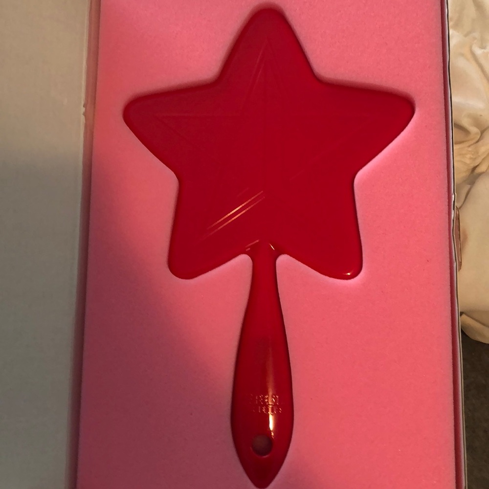 red jeffree star mirror